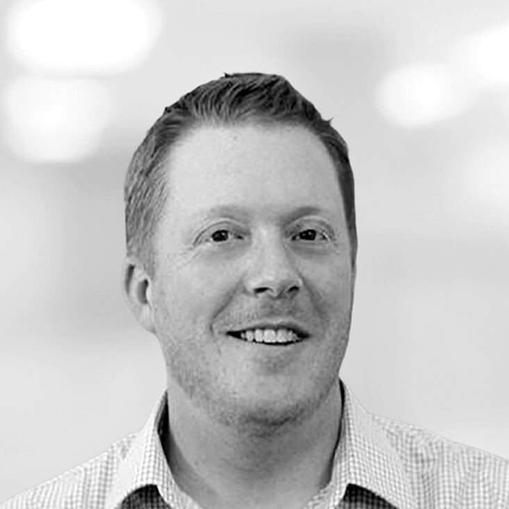 Toppan Merrill Employee Andrew Heintz Headshot in Black and White